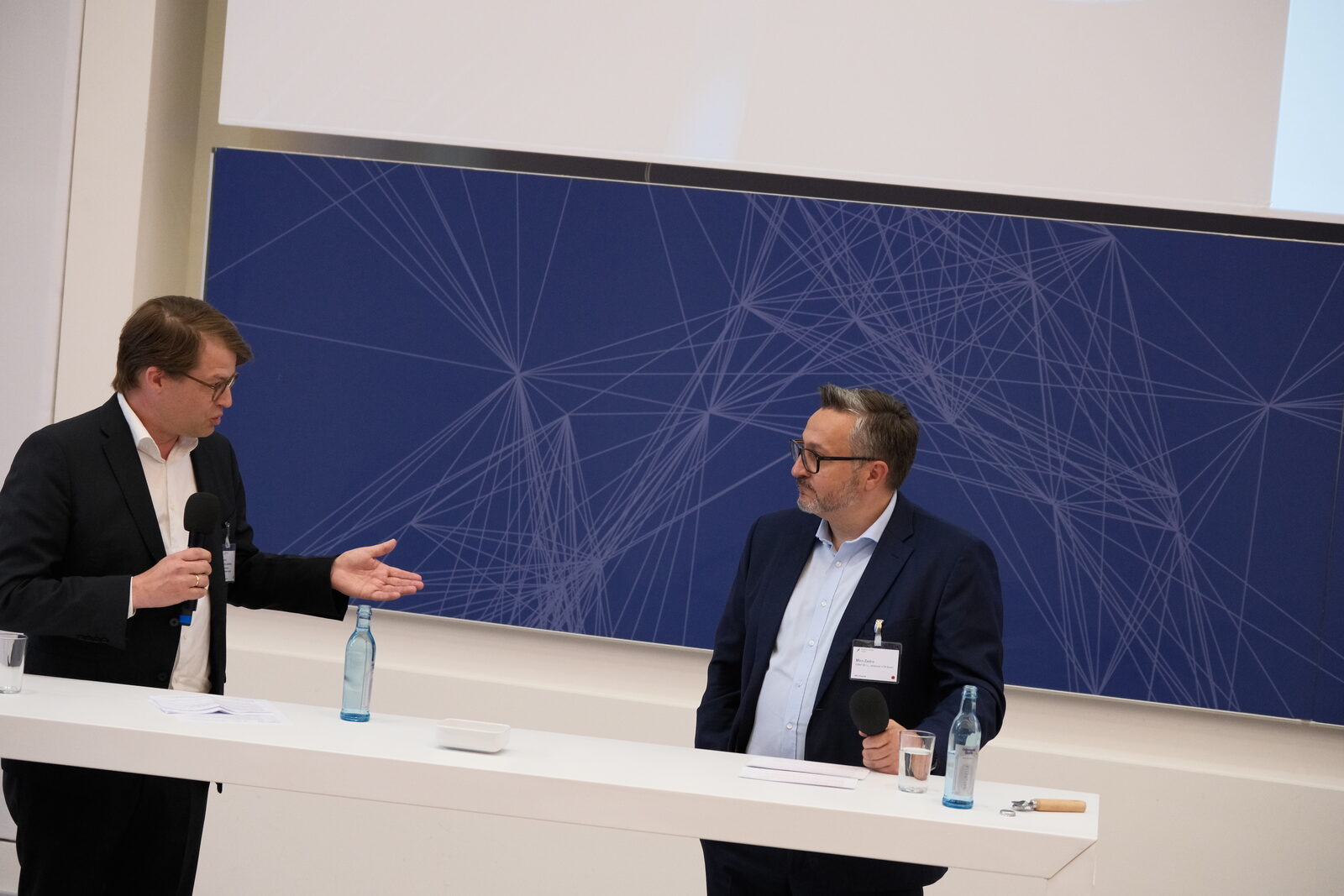 Gespräch auf der Bühne des NPL Forum 26